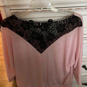 Pink top, black lace back